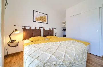 Villa for 7 Guests in Vrbnik with Pool and Sea View