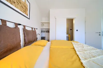 Villa for 7 Guests in Vrbnik with Pool and Sea View