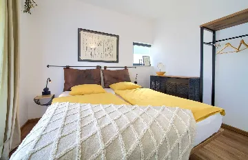 Villa for 7 Guests in Vrbnik with Pool and Sea View