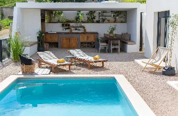 Villa for 7 Guests in Vrbnik with Pool and Sea View