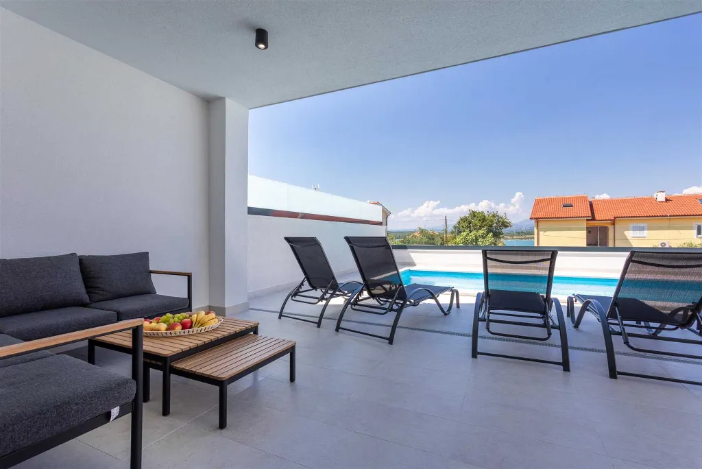 Heated-Pool Villa with Sea Views for 8 in Klimno