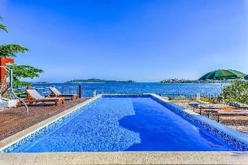 Sevid Villa with Direct Beach Access for Up to 12