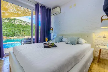 Holiday House in Podimoć with Sea Access & Heated Pool