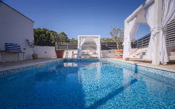 3-Bedroom Villa in Vrbanj for Up to 8 Guests