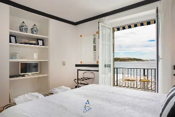 Seafront Villa with Pool in Lozica for 9 Guests