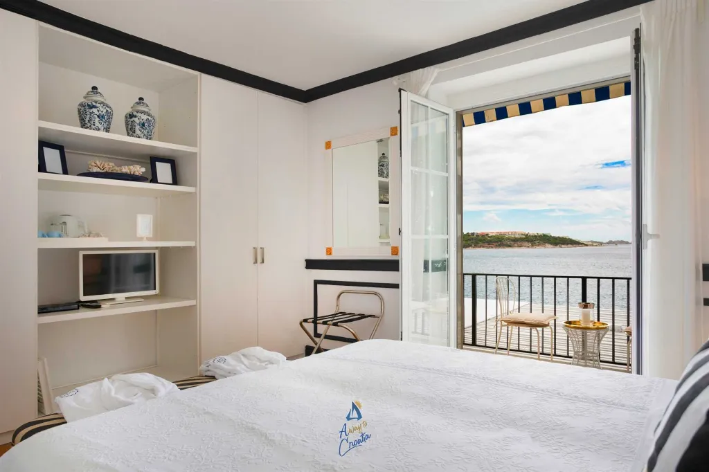 Seafront Villa with Pool in Lozica for 9 Guests