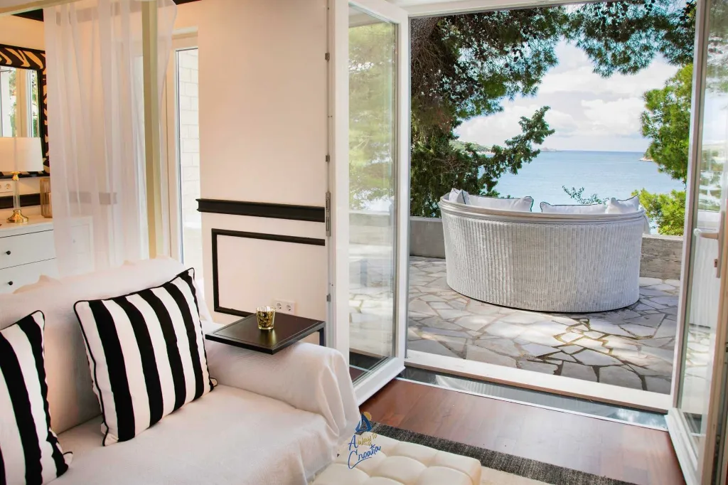 Seafront Villa with Pool in Lozica for 9 Guests