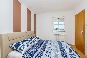 Apartment in Pinezići with Sea View and Pool