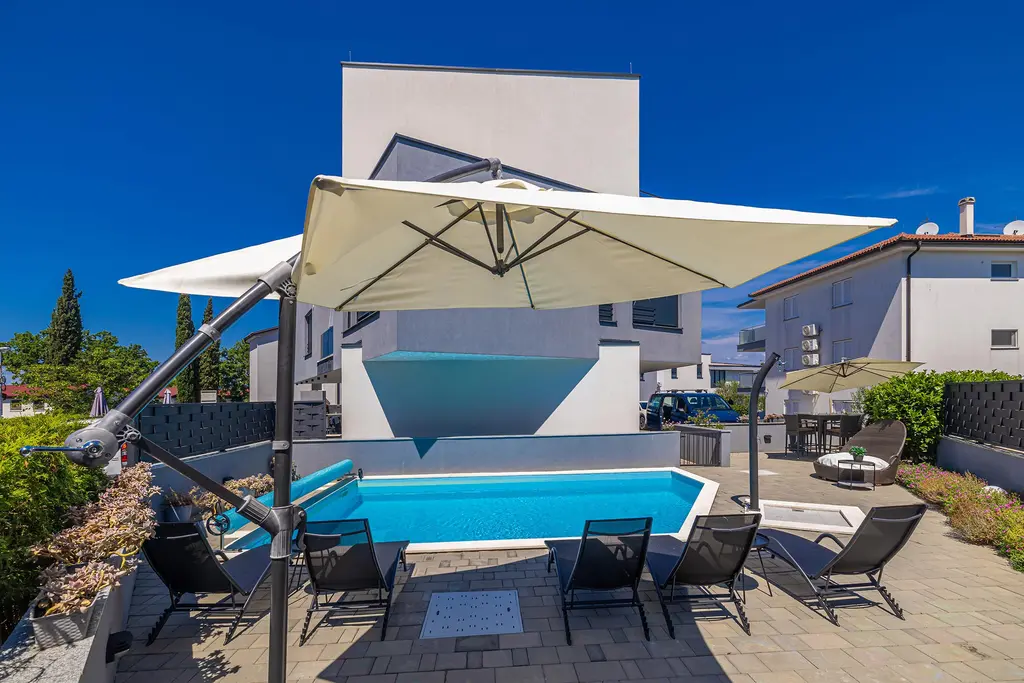 Njivice Apartment with Shared Pool for 5 Guests