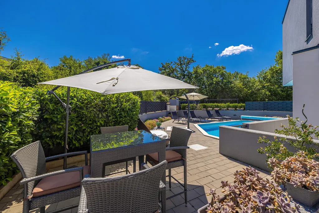 Njivice Apartment with Shared Pool for 5 Guests