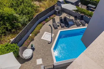 Njivice Apartment with Shared Pool for 5 Guests