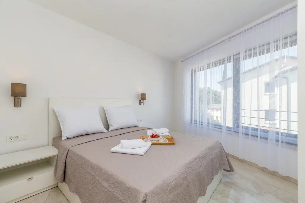 Njivice Apartment with Shared Pool for 5 Guests