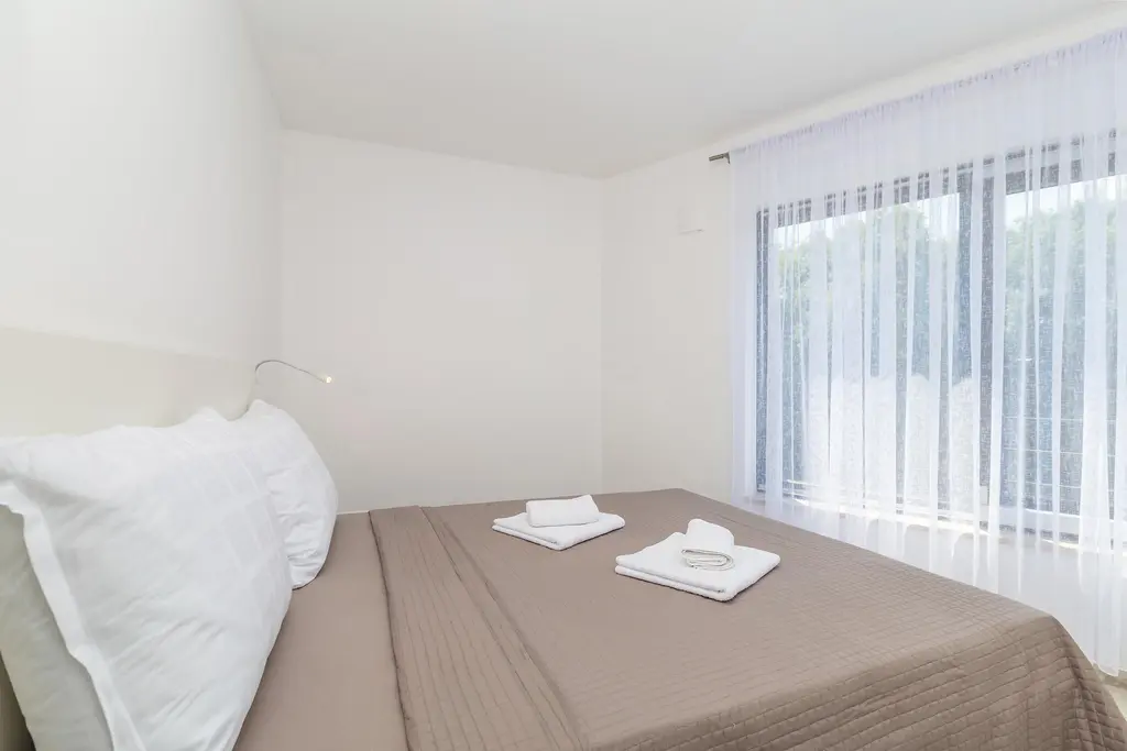 Njivice Apartment with Shared Pool for 5 Guests