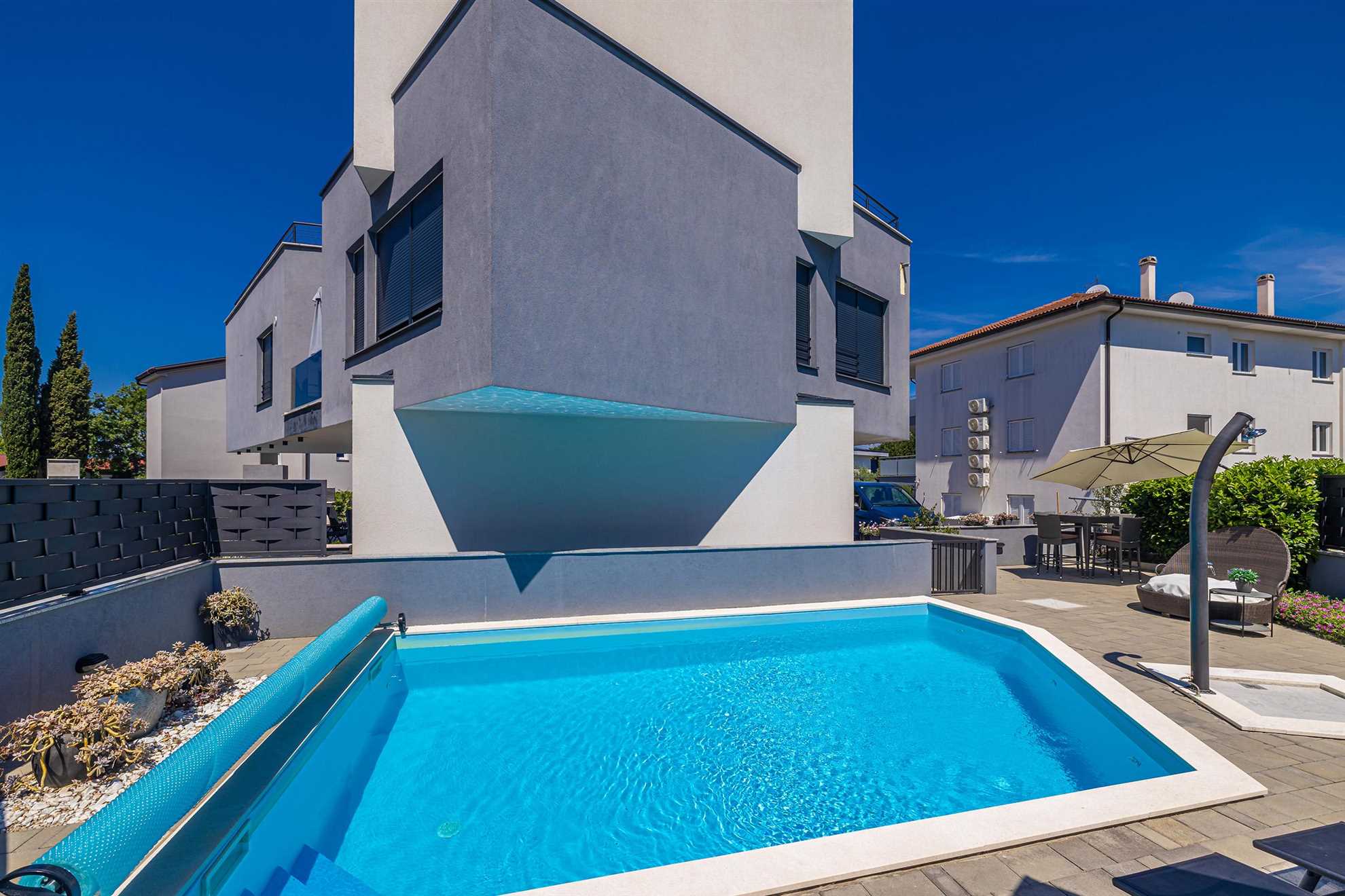 Appartamento LAGANINI II con piscina in comune