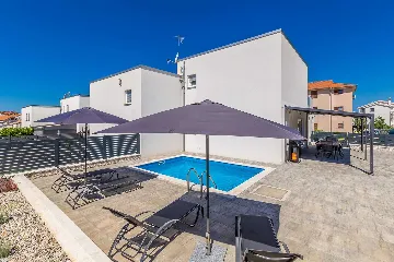 Three-Bedroom Villa with Heated Pool in Malinska