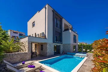 Njivice Apartment with Heated Pool and Private Yard