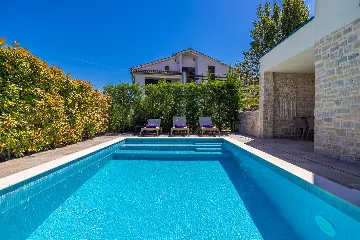 Njivice Apartment with Heated Pool and Private Yard