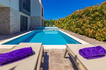 Njivice Apartment with Heated Pool and Private Yard