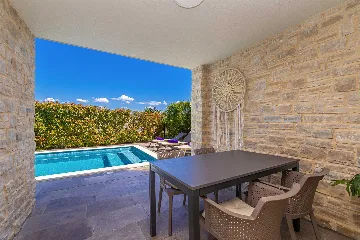 Njivice Apartment with Heated Pool and Private Yard