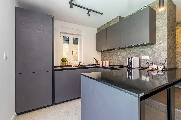 Njivice Apartment with Heated Pool and Private Yard