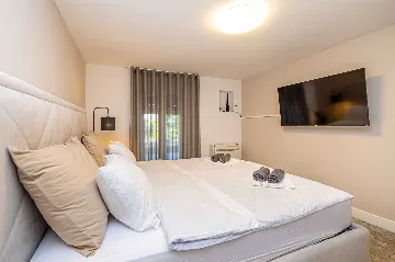 Njivice Apartment with Heated Pool and Private Yard