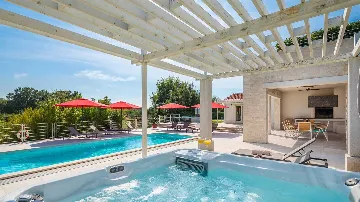 Modern Villa with Heated Pool and Hot Tub in Režanci