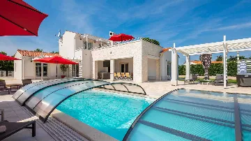 Modern Villa with Heated Pool and Hot Tub in Režanci