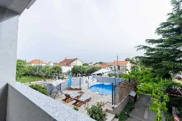 Three-Bedroom Apartment with Pool in Pakoštane