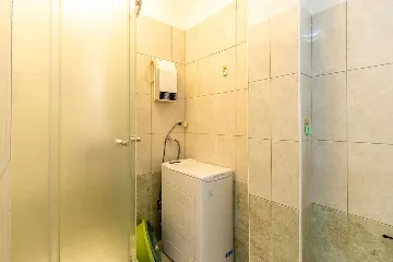 Three-Bedroom Apartment with Pool in Pakoštane