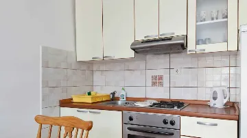 Two-Bedroom Apartment in Kaštel Štafilic with Balcony