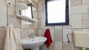 Two-Bedroom Apartment in Kaštel Štafilic with Balcony