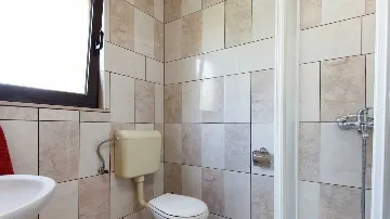 Two-Bedroom Apartment in Kaštel Štafilic with Balcony