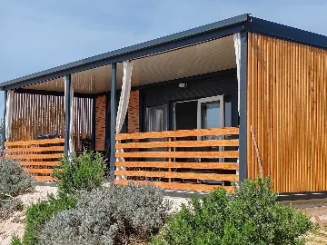 Mobile Home with Terrace and Shared Pool in Pirovac