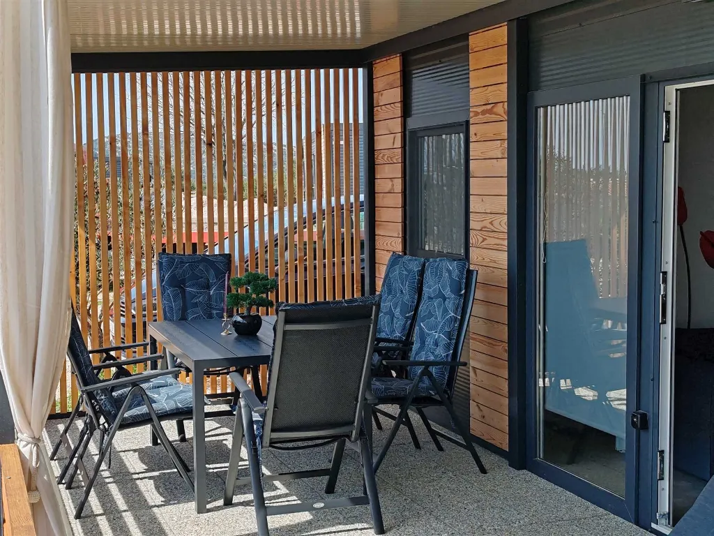 Mobile Home with Terrace and Shared Pool in Pirovac