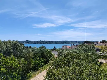 Mobile Home with Terrace and Shared Pool in Pirovac