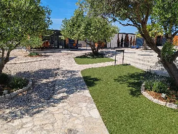 Mobile Home with Terrace and Shared Pool in Pirovac