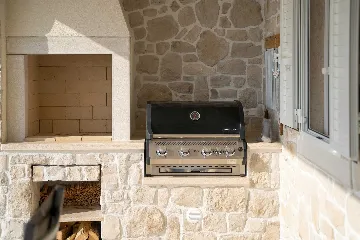 Holiday House with Heated Saltwater Pool in Veli Kosi