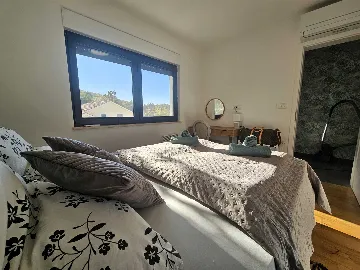 Apartment in Omišalj with Sea-View Balconies