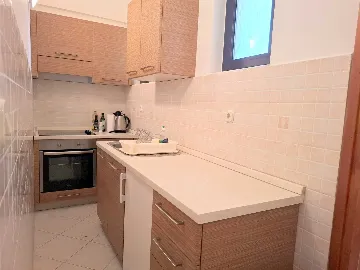 Two-Bedroom Apartment in Malinska for 4 Guests