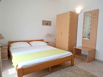 Two-Bedroom Apartment in Malinska for 4 Guests