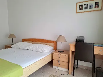 Two-Bedroom Apartment in Malinska for 4 Guests