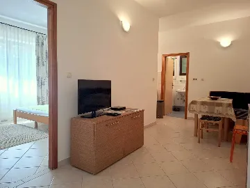 Two-Bedroom Apartment in Malinska for 4 Guests