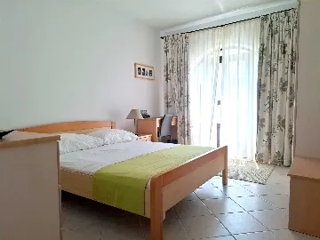Two-Bedroom Apartment in Malinska for 4 Guests