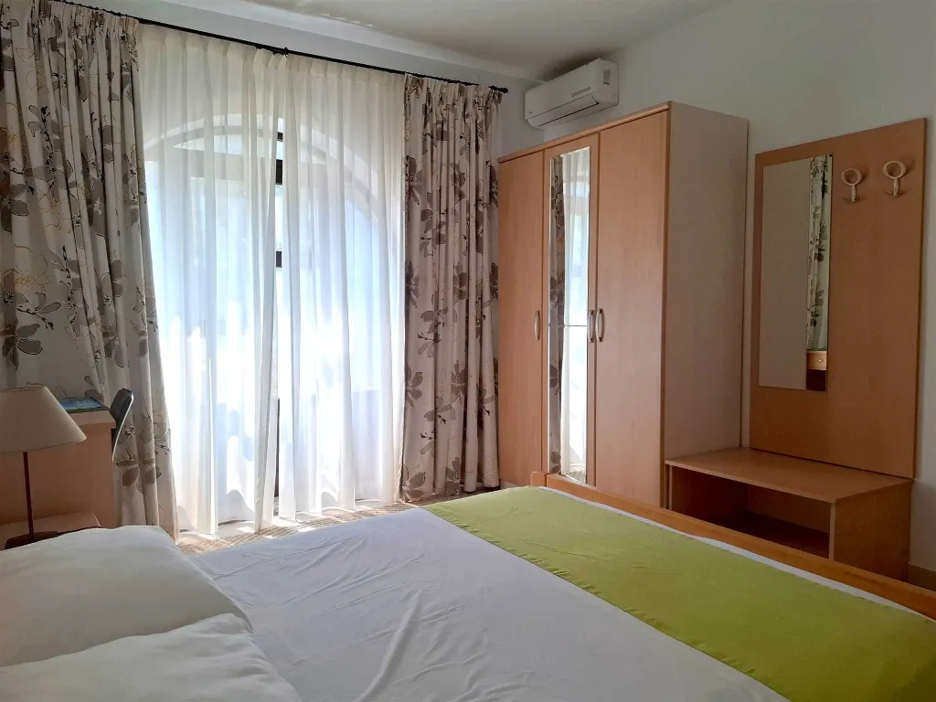 Two-Bedroom Apartment in Malinska for 4 Guests