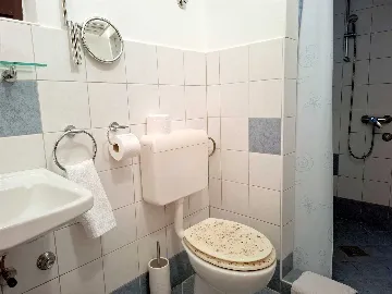 Two-Bedroom Apartment in Malinska for 4 Guests