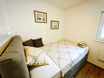 Holiday House in Jadranovo for Up to 4 Guests