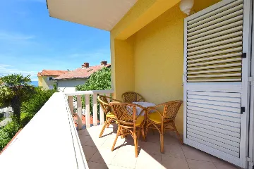 Two-Bedroom Apartment in Malinska for 4 Guests