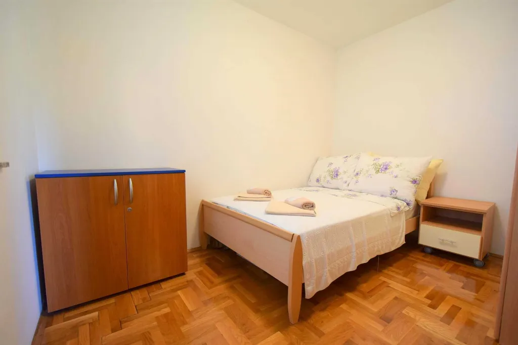 Two-Bedroom Apartment in Malinska for 4 Guests