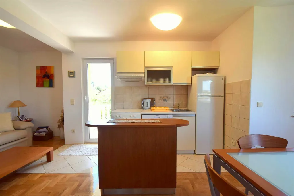 Two-Bedroom Apartment in Malinska for 4 Guests