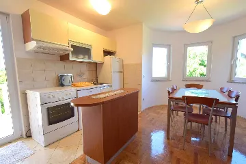 Two-Bedroom Apartment in Malinska for 4 Guests